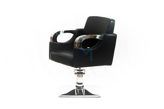 Black hairdressing chair with chromed metal armrests