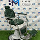 Green and white vintage barber chair