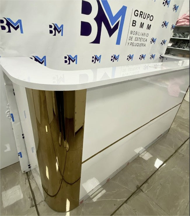 White reception desk with gold left side