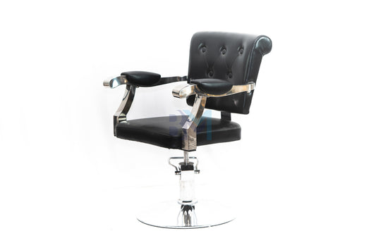 Black hairdressing chair with chromed metal armrests