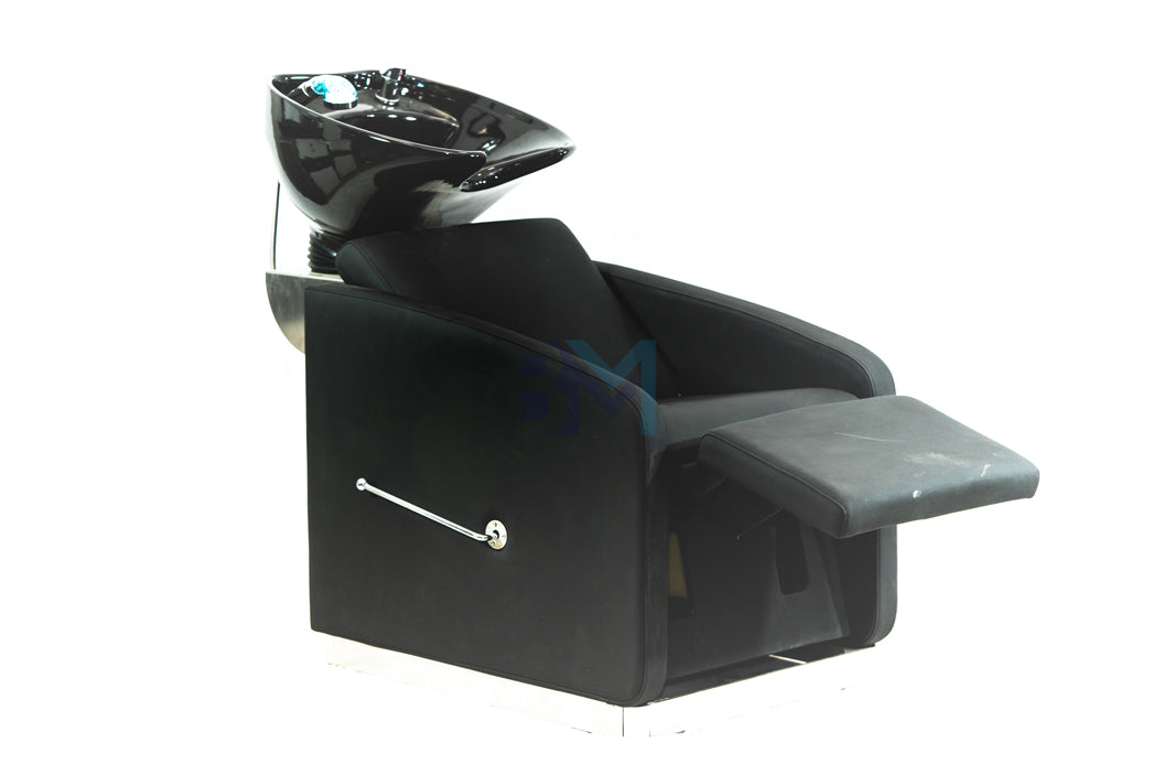 Black washbasin with manual footrest and chrome base