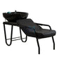 Black washbasin with reclining backrest and black metal structure