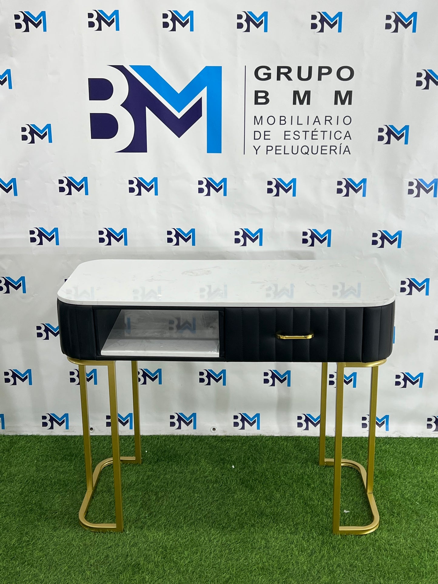 Individual manicure table in black leatherette with marble-like stone and golden base